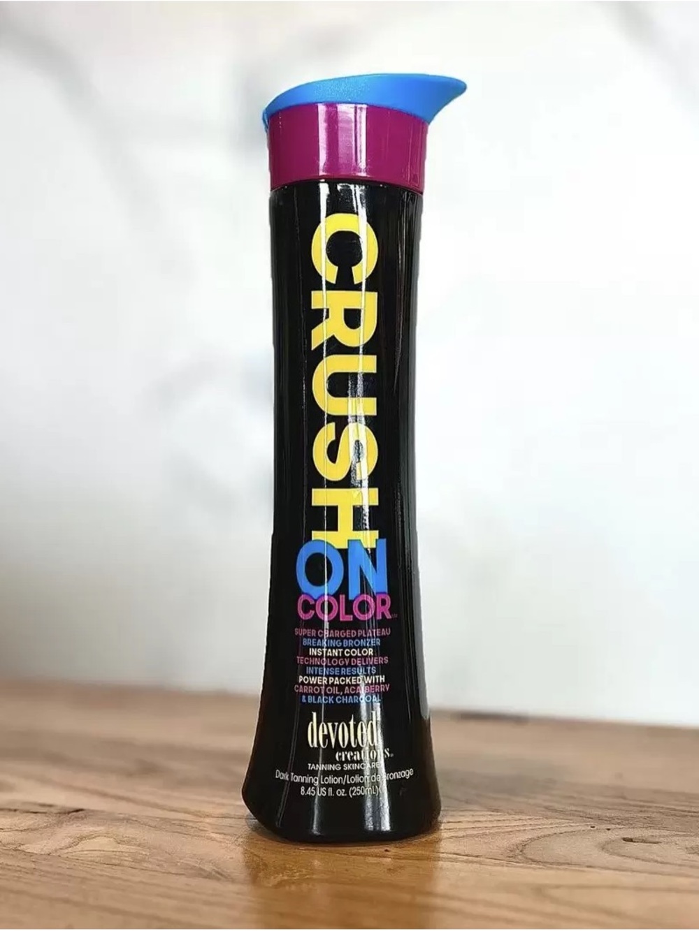 Devoted Creations Crush On Color Tanning Lotion - Black with Blue & Pink Accents
